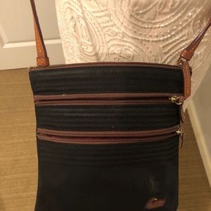 Dooney and Bourke cross body with three zippers